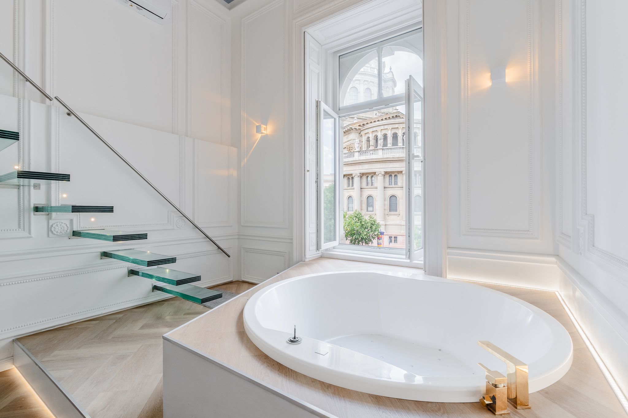 Andrássy Avenue, two gallery-style homes with private jacuzzis and a breathtaking view of St. Stephen’s Basilica.